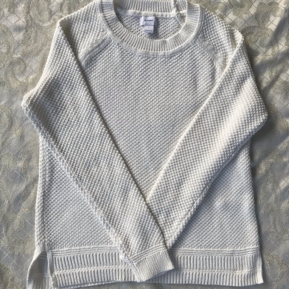 - cream/white knit sweater